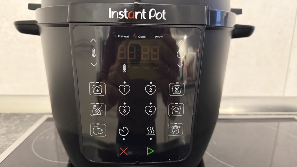 „Instant Pot Multikocher“: Bedienfeld mit Programmsymbolen